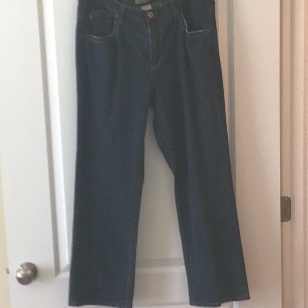 Women's Blue Jeans distressed pockets and hem size 16 used good condition